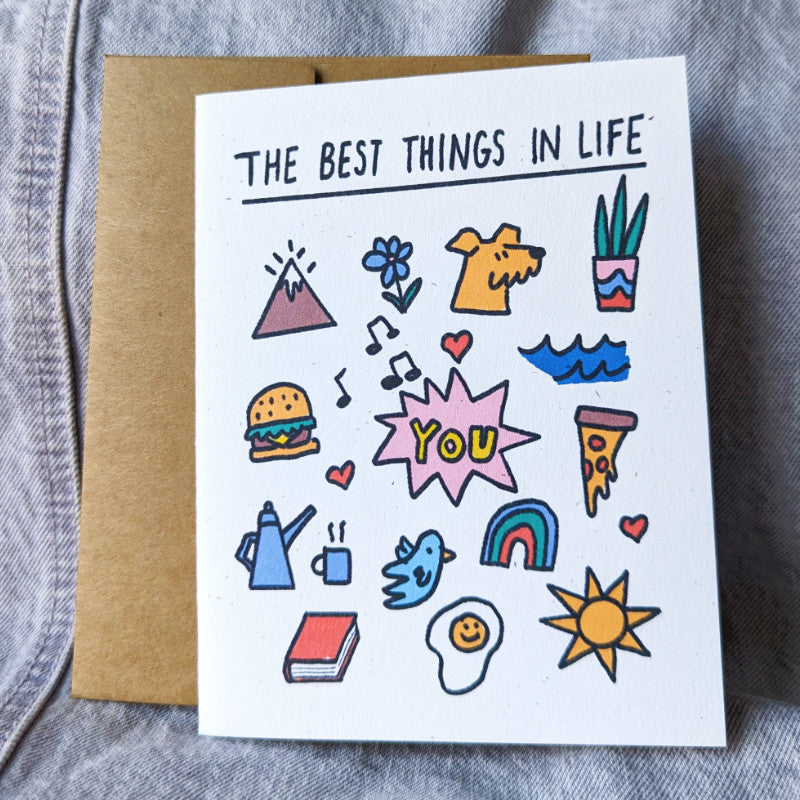 greeting card that says "the best things in life" and pictures a bunch of good things like pizza, birds, dogs... but "you" is in the center