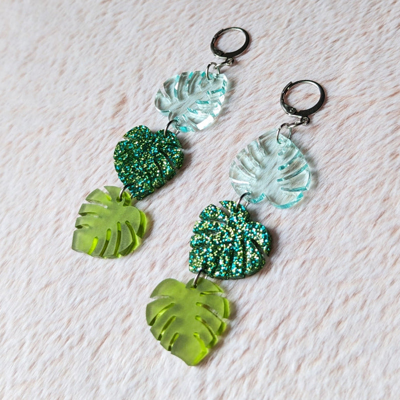cute glittery dangle acrylic earrings of monstera leaves