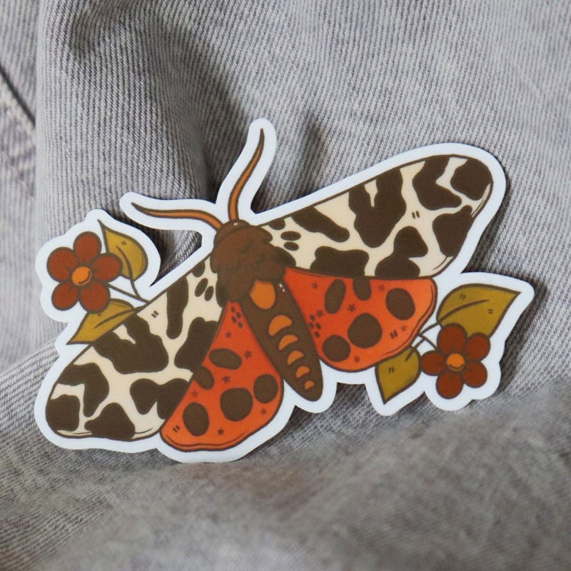 a nature sticker featuring a garden moth