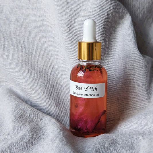 cool mystical dropper bottle of intention oil for self love