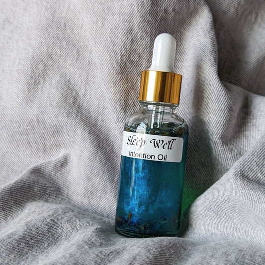 cool mystical dropper bottle of intention oil for better sleep