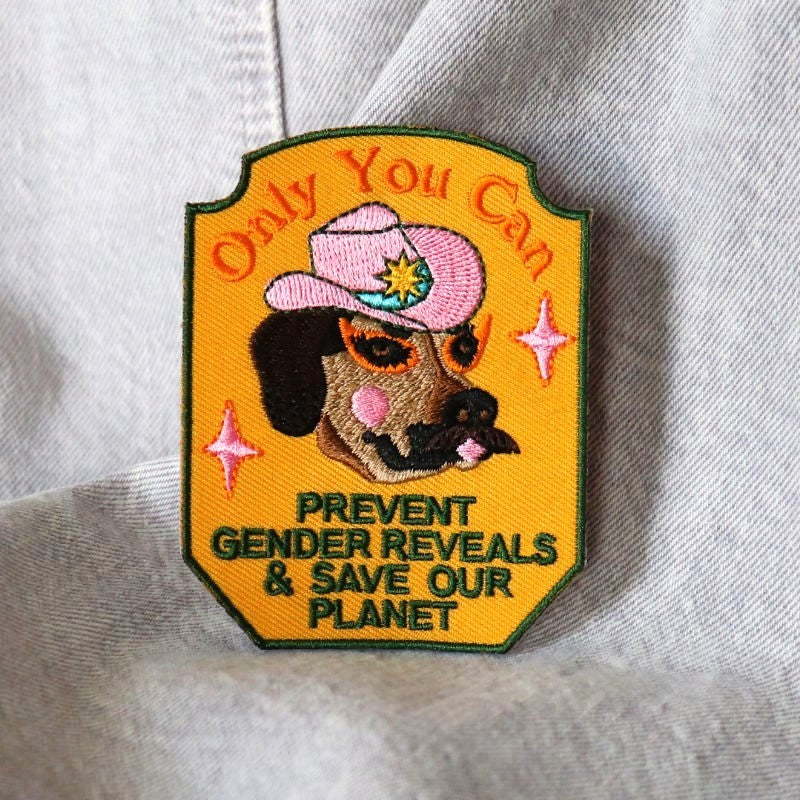 an embroidered patch of a dog wearing a cowboy hat that says" only you can prevent gender reveals & save our planet"
