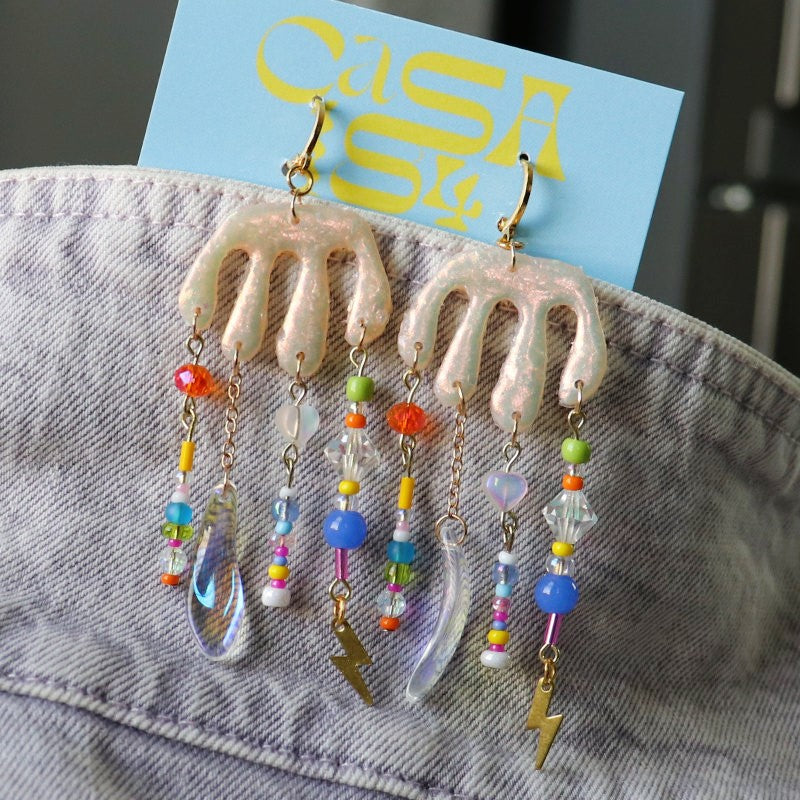 iridescent polymer clay earrings with dangling chains and beads