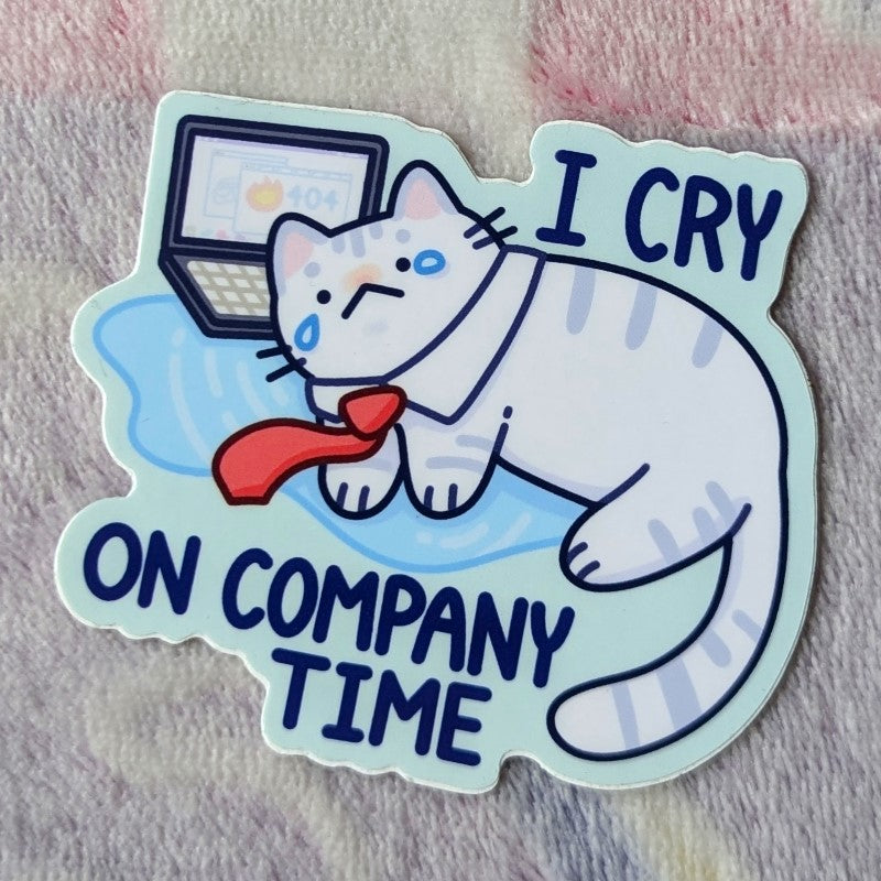 funny sticker of a cat crying at a computer and the words "I cry on company time"