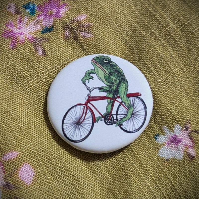 frog on a bicycle button