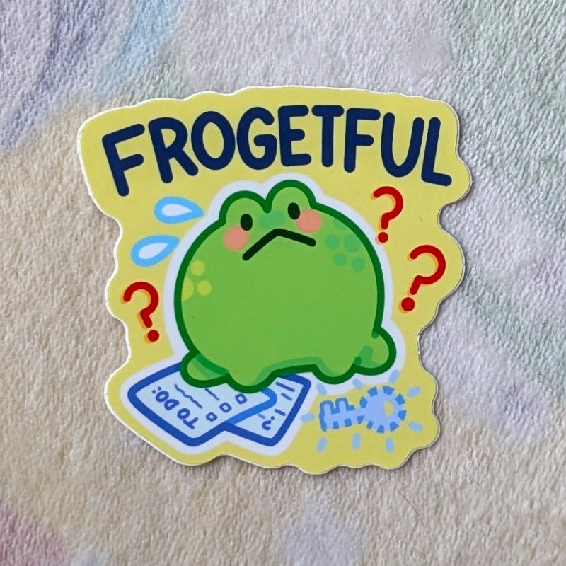 cute picture of a frog looking confused and the word "frogetful"