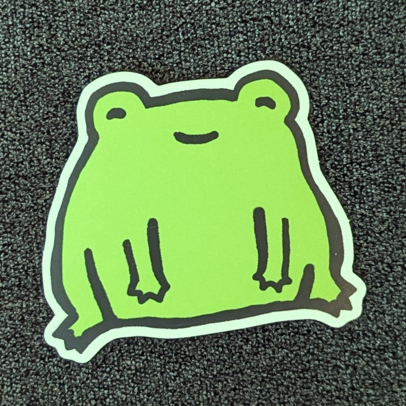 cute sticker of a happy little frog