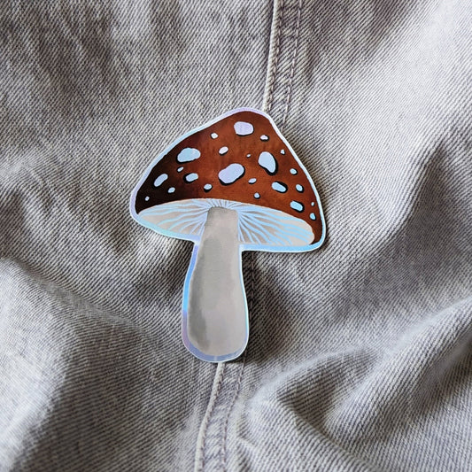 cool holographic sticker of a red capped mushroom