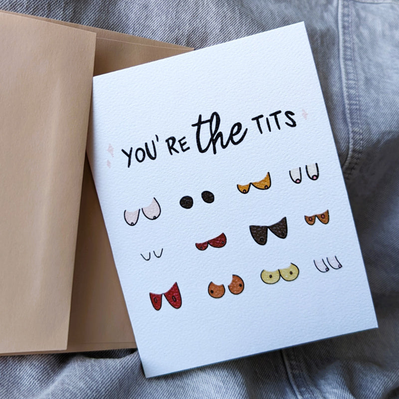 funny greeting card that says "you're the tits" and features several different types of breasts