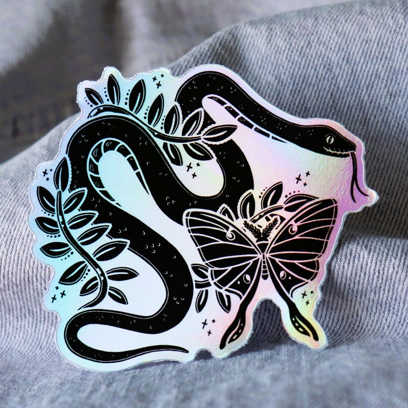 cool and spooky holographic sticker of a snake and a luna moth