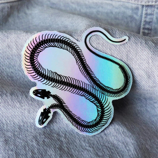 cool holographis sticker of the skeleton of a two-headed snake