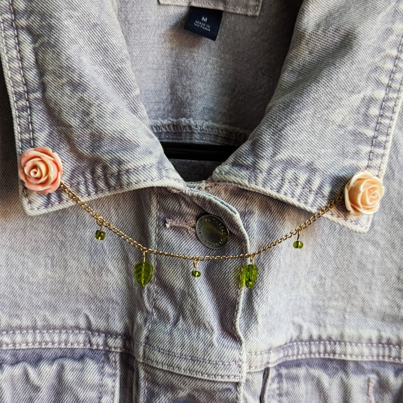 cute pink rose lapel pins, with a gold chain and leaf beads between them