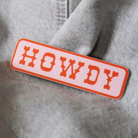 rectangular vinyl sticker with the word "howdy"