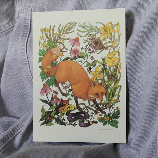 print of a fox surrounded by meadow flowers and a snake